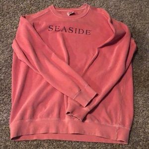 Seaside crewneck ,Redish pink color black/navy blue logo ….medium